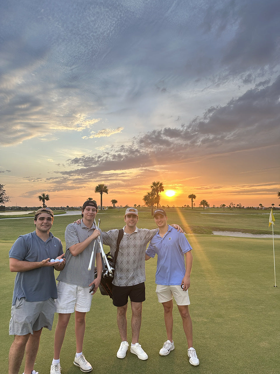Zack Corbin and his crew at a golf course at sunset